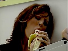 Hot brunette entices guy with banana then sucks his cock