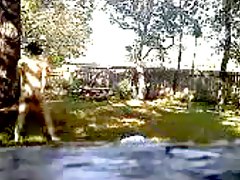 Latin slut naked in the back yard