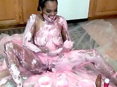 Black girl rubs food all over her naked body