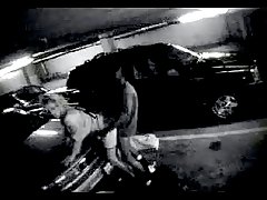 Woman having sex in a parking lot