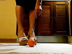 Waitress play and crush orange in sexy platform heels