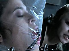Bondage and bagging for a sub girl in a kinky device
