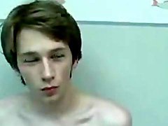Teen in jeans strips and strokes his dick to orgasm