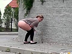 Fine ass girl takes a piss on a street corner