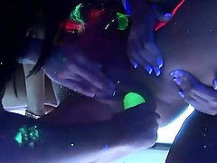 Babes in the strip club finger fuck under a black light