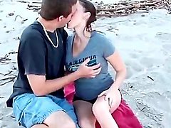 Kissing a cutie that sucks his dick on the beach