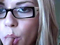 Webcam beauty in glasses masturbates her vagina