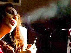 Slender brunette is smoking in a sexy way as never before