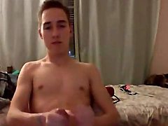 Skinny twink has a gorgeous cock that he strokes