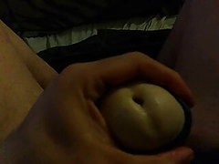 Slow-Motion Closeup of Man Cumming With Open Masturbator