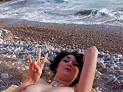 brunette with natural tits has anal sex by the sea