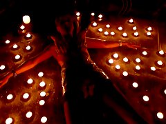 Busty girl surrounded by candles and get hot waxed